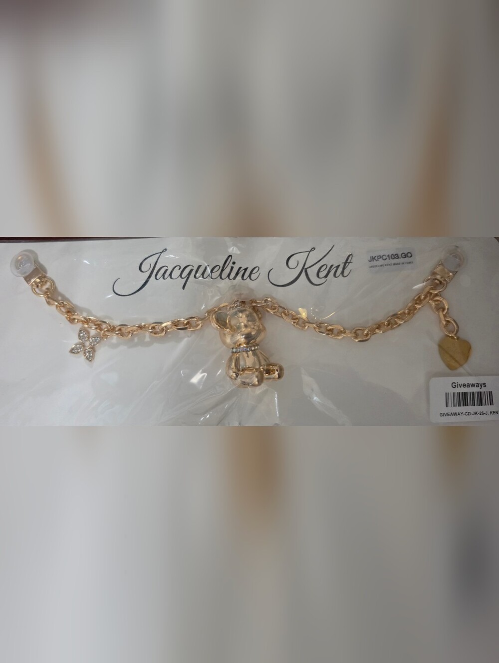 Gold Teddy Bear Purse Charm. Designed by Jacqueline Kent